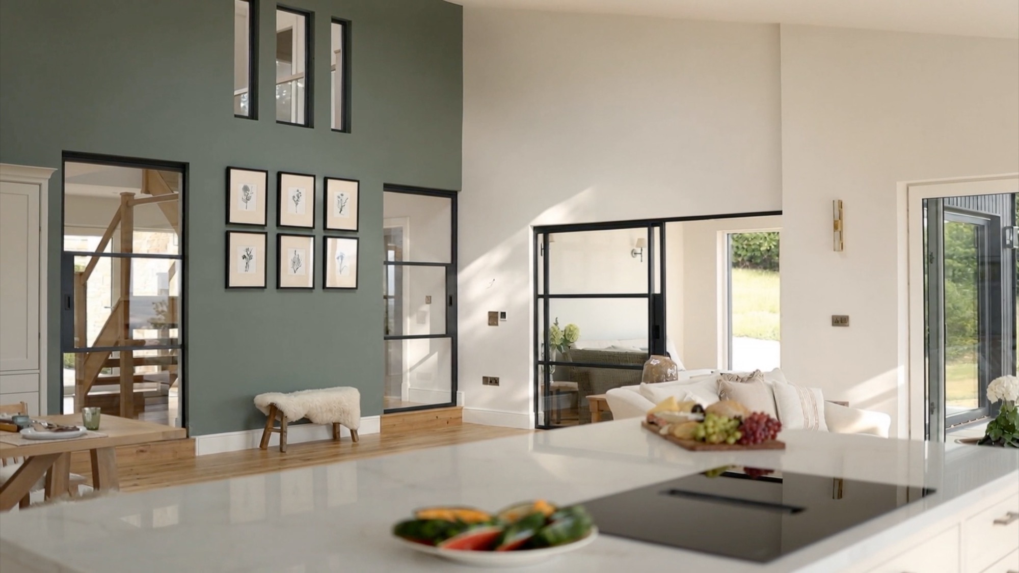 Muted green feature wall and timber details